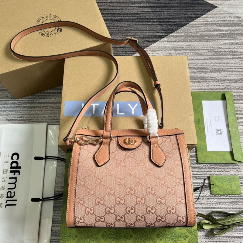 G*u*i top handle bags
